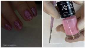 Red-pink manicure with talitacardozo glitter